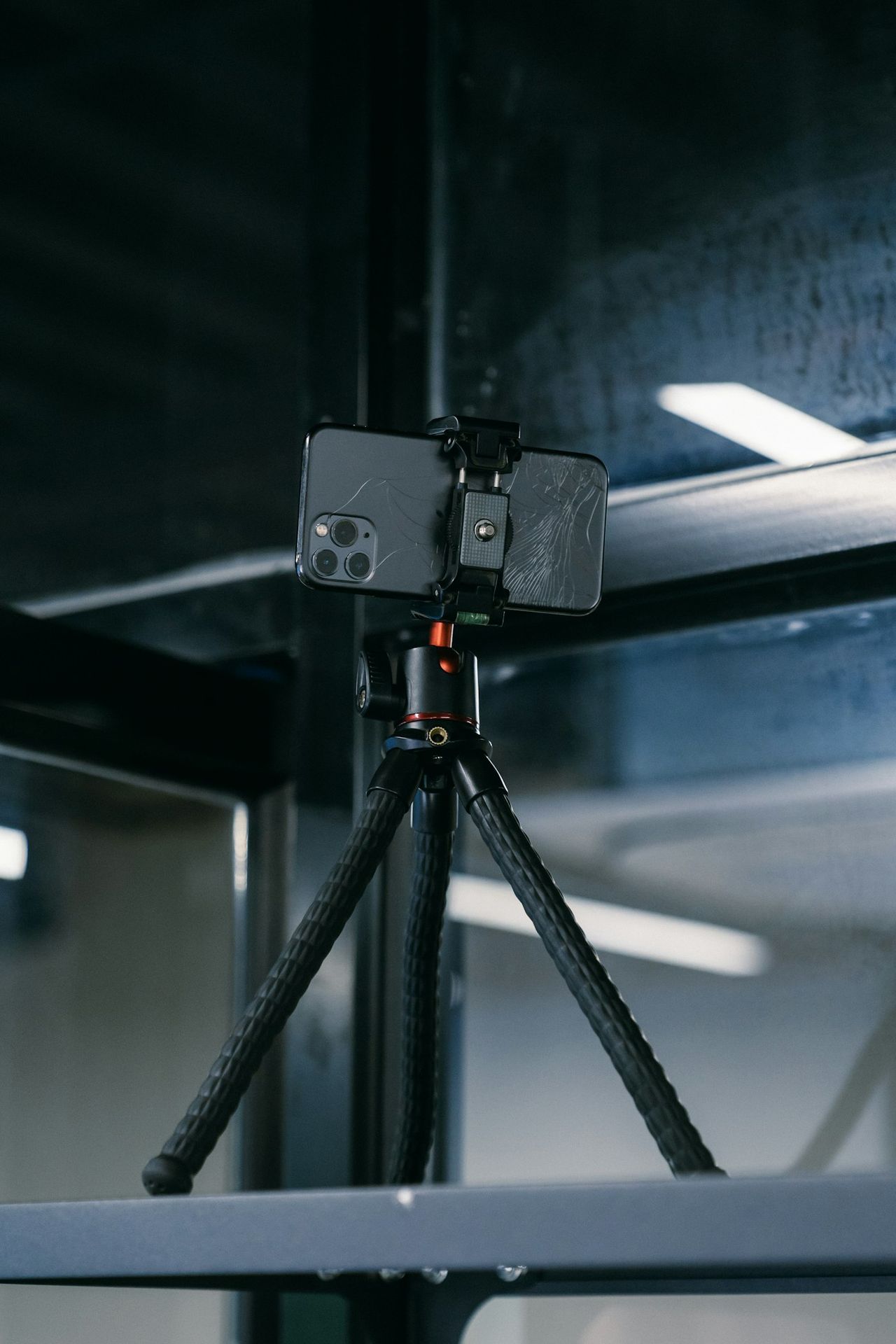 Phone mounted on a tripod for short-form video recording